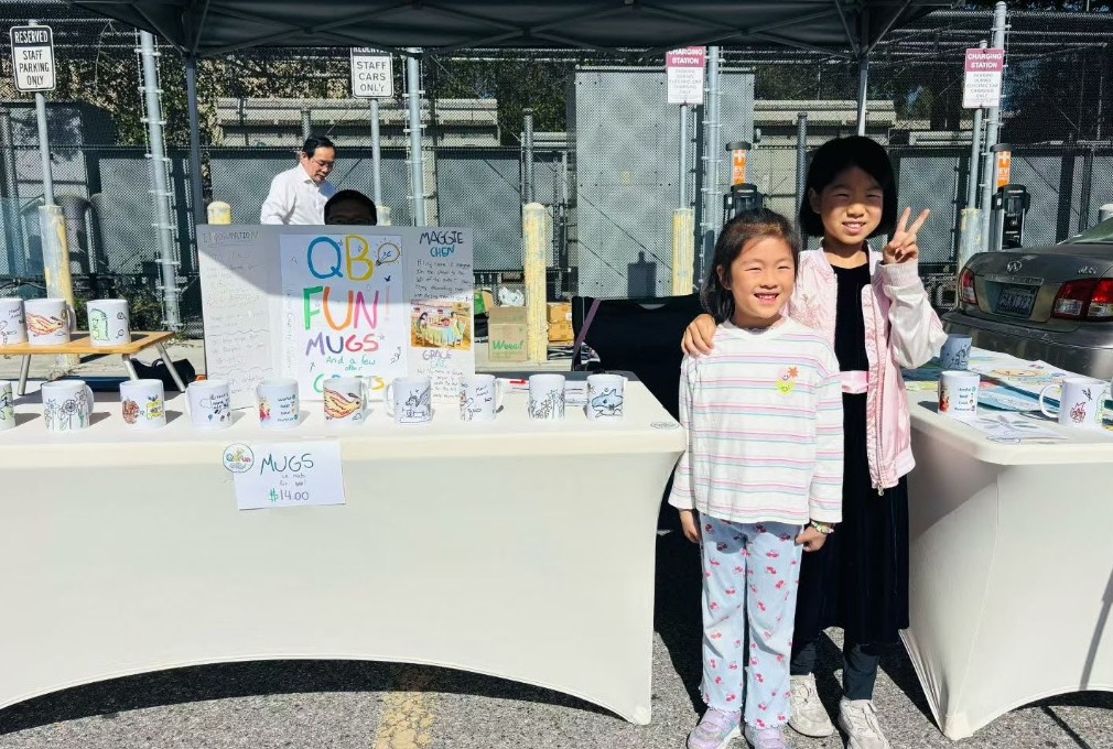 Maggie Chen and Grace Cai at their very first vendoring booth at De Anza Flea Market in Cupertino, CA on June 6, 2026