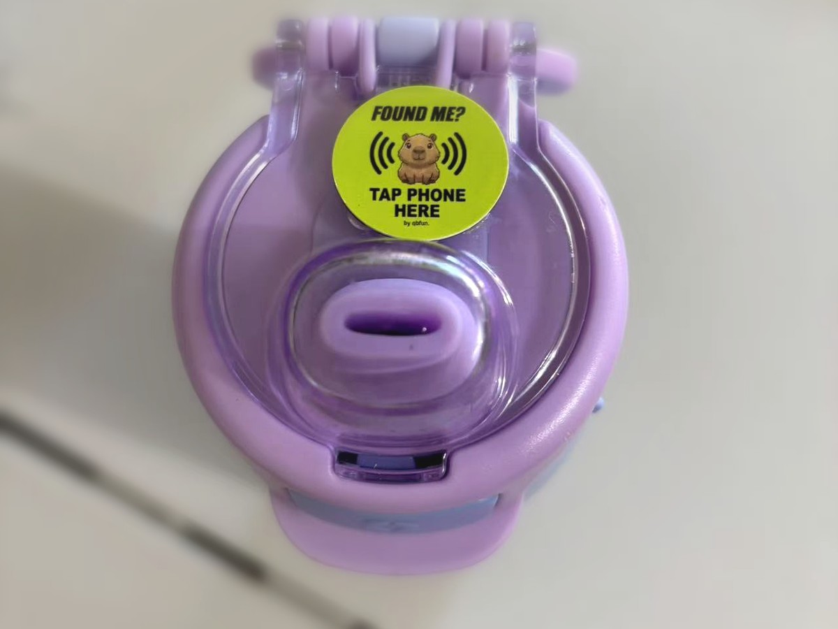 QB Smart Sticker on a purple water bottle